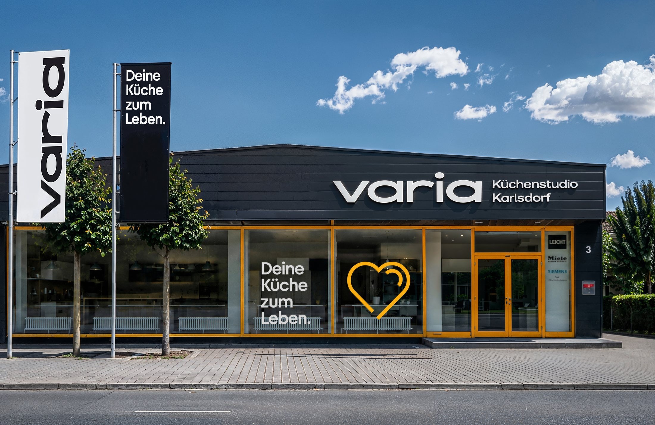 Visualisierung: Fassade des varia Küchenstudios Karlsdorf mit der neuen Beschilderung